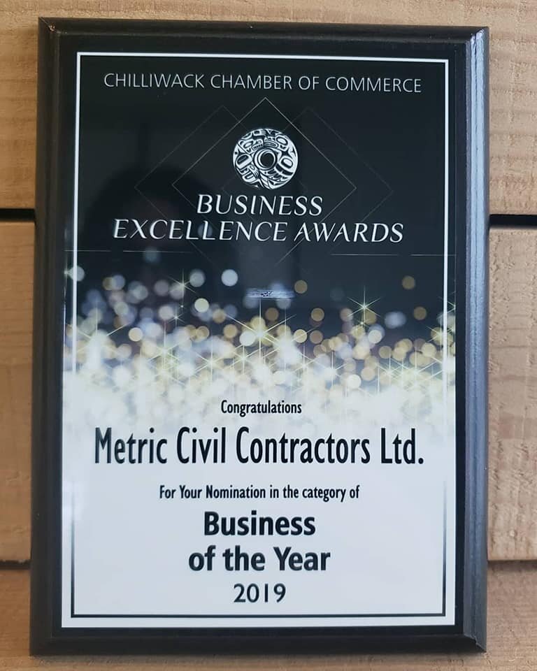 Metric business excellence award. Plaque recognizing Metric Civil as business of the year in 2019.